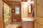 Antler Lodge - Main bath and shower.